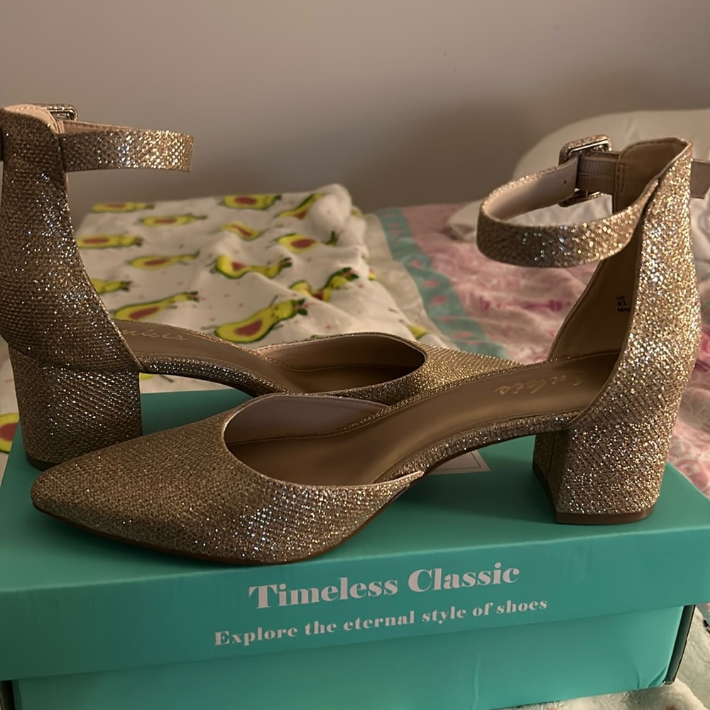 Never worn gold heels